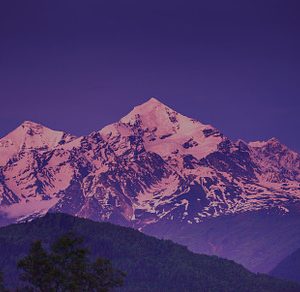 Sunset over a Snowy Mountain Peak