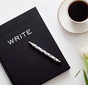 Coffee and Journal Stock Photo